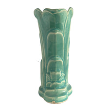 Load image into Gallery viewer, Beautiful vintage Swan vase glazed in gloss aqua, features a swan swimming in the reeds. Crafted by McCoy Pottery, 1948. This vase is must for any art pottery collector!

In excellent vintage condition, no chips, no cracks, no repairs. Minor manufacturer's defects, see photos. Maker's mark on the bottom.

Measures 6 7/8 x 4 1/8 x 9 1/4 inches
