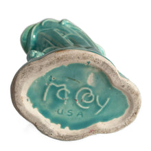 Load image into Gallery viewer, Beautiful vintage Swan vase glazed in gloss aqua, features a swan swimming in the reeds. Crafted by McCoy Pottery, 1948. This vase is must for any art pottery collector!

In excellent vintage condition, no chips, no cracks, no repairs. Minor manufacturer's defects, see photos. Maker's mark on the bottom.

Measures 6 7/8 x 4 1/8 x 9 1/4 inches
