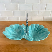 Load image into Gallery viewer, Vintage mid-century era aqua lotus leaf 2-part divided candy dish with silver-toned ring handle. Crafted by California Pottery, USA, 1950s. A lovely serving piece for nuts, candies....whatever you fancy!

In excellent condition, no chips/cracks/repairs. Reinforced handle with new rubber washer.

Measures 10 3/4 x 6 x 1 3/4 inches (6 1/4 inches with handle)
