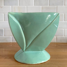 Load image into Gallery viewer, Vintage aqua twisted square footed ceramic jardiniere planter 1240/65. Crafted by Robinson Ransbottom Pottery Co., USA, 1940s. A beautiful home for your favourite houseplant and a wonderful addition to your art pottery collection!

In excellent condition, no chips/cracks/repairs. Typical age-related crazing and manufacturer&#39;s glaze pops.

Measures 6 1/2 x 6 1/2 x 6 1/8 inches
