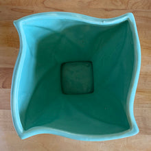 Load image into Gallery viewer, Vintage aqua twisted square footed ceramic jardiniere planter 1240/65. Crafted by Robinson Ransbottom Pottery Co., USA, 1940s. A beautiful home for your favourite houseplant and a wonderful addition to your art pottery collection!

In excellent condition, no chips/cracks/repairs. Typical age-related crazing and manufacturer&#39;s glaze pops.

Measures 6 1/2 x 6 1/2 x 6 1/8 inches
