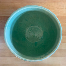 Load image into Gallery viewer, Large vintage Tierra Cushion jardiniere planter pot, aqua gloss glaze, features an overlapping floral leaf pattern around the top rim, a diamond quilted body and ribbon handles. Crafted by McCoy Pottery, USA, 1950s. A must-have for any McCoy collector or gardener!

In excellent condition, free from chips, cracks or repairs, with a manufacturer's glaze pops and like defects, see photo. Maker's mark.

Measures 9 x 7 1/4 inches
