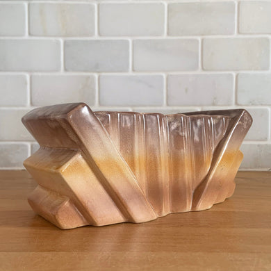 Unique vintage Art Deco Bauhaus geometric ceramic planter finished with tan and yellow drip glaze, shape #203. Crafted by Shorter & Son, England, 1920/30s.

In excellent condition, no chips/cracks/repairs.

Measures 7 1/8 x 3 1/2 x 3 1/8 inches