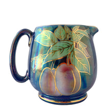 Load image into Gallery viewer, Side view of Britannia Pottery Scotland lustreware pitcher showing iridescent oil-slick glaze
