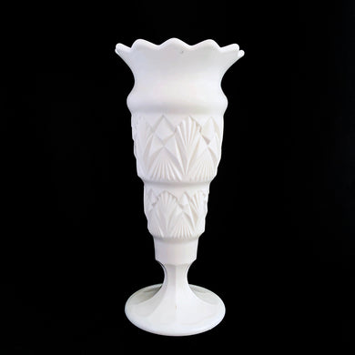Vintage depression era art deco stepped milk glass footed vase featuring a unique repeating pattern of fans on each step and finished with a flared wide sawtooth edge. Make unknown, possibly McKee or Kemple.  In excellent condition, free from chips.  Measures 4 1/8 x 9 inches