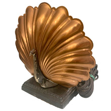 Load image into Gallery viewer, Vintage art deco peacock TV table lamp features a cast metal base, chrome plated peacock body and stamped copper feather fan. The bottom is stamped with a crest with the letters SP, but we are unable to determine the maker. Given that peacock are considered to be exotic, this piece of lighting history shows off the height of sophistication in the art deco era!

In as found vintage condition with significant wear to the chrome and a nice overall patina.

Measures 8 7/8 x 3 1/2 x 8 1/4 inches
