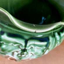 Load image into Gallery viewer, Vintage Art Nouveau style green drip glazed majolica ceramic jardiniere planter with floral pattern and scalloped edge. Crafted by WF Needham, England, early 1900s. Fill this beauty with your favourite plants or use as decor!

In as found condition, with chip and L shaped crack. Marked England.

Measures 8 x 6 1/4 inches
