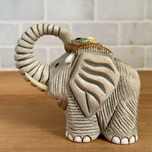 Load image into Gallery viewer, Artesania Rinconada elephant figurine number 9 vintage Uruguay art pottery side view showing body texture with glazed brown ribbed saddle collectible figurine
