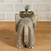 Load image into Gallery viewer, Artesania Rinconada elephant figurine, rear view showing decorative floral medallion on back with cobalt, turquoise, and lime enamel dots, handmade art pottery, Uruguay, vintage
