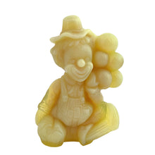 Load image into Gallery viewer, Vintage Arty All the World Loves a Clown vaseline uranium slag glass figurine. Crafted by Mosser Glass, USA, 1981 - 1982. This adorable little clown holding a bunch of balloons glows beautifully under black light. An adorable collectible!

In like new condition, in original box with leaflet.

Measures 2 3/4 x 1 3/8 x 3 1/2 inches
