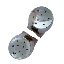 Load image into Gallery viewer, Vintage atomic amber glass salt and pepper shakers with plasticized chrome lids. Crafted by Libbey Glass, 1960s. Add this classic to your tableware collection!

In excellent condition, no chips.

Measures 1 5/8 x 1 5/8 x 4 1/8 inches
