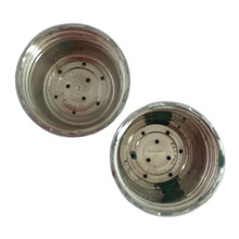 Load image into Gallery viewer, Vintage atomic amber glass salt and pepper shakers with plasticized chrome lids. Crafted by Libbey Glass, 1960s. Add this classic to your tableware collection!

In excellent condition, no chips.

Measures 1 5/8 x 1 5/8 x 4 1/8 inches
