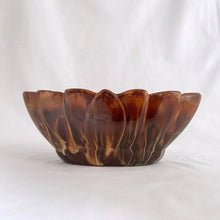 Load image into Gallery viewer, Vintage oval shaped redware pottery planter, finished with Aurora Borealis drip glaze in tones of brown, toffee and green on a lily pattern. Produced by CCC Pottery, Canada, circa 1960s.   In excellent condition, free from cracks/repairs. A couple of minor flea bites to the rim which aren&#39;t too noticeable thanks to the colour of the redware.  Measures 8 3 1/8 x 3 1/8 inches
