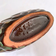 Load image into Gallery viewer, Vintage oval shaped redware pottery planter, finished with Aurora Borealis drip glaze in tones of brown, toffee and green on a lily pattern. Produced by CCC Pottery, Canada, circa 1960s.   In excellent condition, free from cracks/repairs. A couple of minor flea bites to the rim which aren&#39;t too noticeable thanks to the colour of the redware.  Measures 8 3 1/8 x 3 1/8 inches
