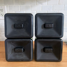 Load image into Gallery viewer, Vintage set of four retro avocado green plastic kitchen canisters topped with brown lids. Each has funky retro deboosed typography in brown. Includes flour, sugar, cookies and tea. Crafted by Beacon Plastics, Canada, 1970s. Add these beauties to retro-fy your kitchen countertop!

In great vintage condition. These canisters appear to be well cared for, with age appropriate wear to the plastic. Maker&#39;s mark on the bottom.

