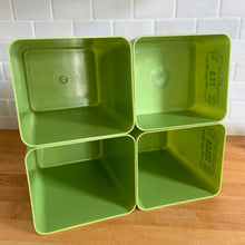 Load image into Gallery viewer, Vintage set of four retro avocado green plastic kitchen canisters topped with brown lids. Each has funky retro deboosed typography in brown. Includes flour, sugar, cookies and tea. Crafted by Beacon Plastics, Canada, 1970s. Add these beauties to retro-fy your kitchen countertop!

In great vintage condition. These canisters appear to be well cared for, with age appropriate wear to the plastic. Maker&#39;s mark on the bottom.
