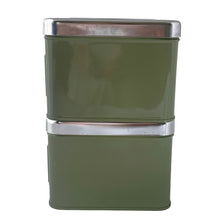 Load image into Gallery viewer, Vintage set of four avocado green retro kitchen canisters topped with chrome lids and green knobs. Each has period style typography in green plastic medallion with a silver letter to represent flour, sugar, coffee and tea. EKCO, Canada, 1970s. Add these beauties to retrofy your countertop! Great vintage condition. Canisters appear to be well cared for, with age appropriate wear to the paint mainly on the Sugar and Flour canisters. Stamped on the bottom with Made in Canada.
