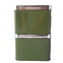 Load image into Gallery viewer, Vintage set of four avocado green retro kitchen canisters topped with chrome lids and green knobs. Each has period style typography in green plastic medallion with a silver letter to represent flour, sugar, coffee and tea. EKCO, Canada, 1970s. Add these beauties to retrofy your countertop! Great vintage condition. Canisters appear to be well cared for, with age appropriate wear to the paint mainly on the Sugar and Flour canisters. Stamped on the bottom with Made in Canada.
