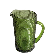 Load image into Gallery viewer, Vintage pressed glass avocado green &quot;Soreno&quot; pitcher featuring a textured bark surface. Crafted by Anchor Hocking, USA, 1966–1970. Perfect for serving your favourite beverage! In excellent condition, free from chips. Measures 3 7/8 x 6 1/2 inches Capacity 26 ounces
