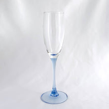 Load image into Gallery viewer, Set of six, delightful vintage Luminarc "Azur" pale blue stemmed champagne flute glasses. Crafted by Cristal d'Arques-Durand, France, between 1991 - 2006. The prettiest glass for any special occasion or to ring in the New Year!  In excellent condition, free from chips/cracks.  Measures 2 3/4 x 8 5/8 inches
