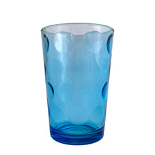 Load image into Gallery viewer, Set of six, vintage style azure blue &quot;Mirage&quot; glass flat tumbler featuring a raised dots or circles pattern. Crafted by Pasabahce, Turkey. Beautiful drinkware for everyday use or cocktails!  Measures 2 5/8 x 3 7/8 inches  Capacity 6 ounces
