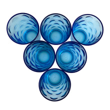 Load image into Gallery viewer, Set of six, vintage style azure blue &quot;Mirage&quot; glass flat tumbler featuring a raised dots or circles pattern. Crafted by Pasabahce, Turkey. Beautiful drinkware for everyday use or cocktails!  Measures 2 5/8 x 3 7/8 inches  Capacity 6 ounces
