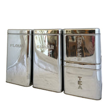 Load image into Gallery viewer, Detail of vintage chrome canister surface showing age patina and wear, Lincoln BeautyWare 1940s–60s kitchenware 
