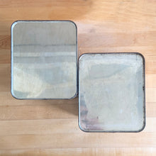Load image into Gallery viewer, Overhead view of two vintage Lincoln BeautyWare chrome canisters, smooth steel with patina
