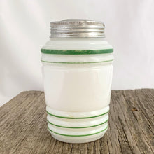 Load image into Gallery viewer, Vintage art deco beehive green striped milk glass pepper shaker featuring the word &quot;PEPPER&quot; in green. Crafted by Hazel-Atlas Glass, USA, 1930s. This highly collectible piece of depression glass will make a great addition to your tableware and kitchen decor!  In great vintage condition, no chips to the glass, minor wear to the paint and lid.  Measures 2 5/8 x 4 3/8 inches
