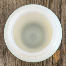 Load image into Gallery viewer, Vintage art deco beehive green striped milk glass pepper shaker featuring the word &quot;PEPPER&quot; in green. Crafted by Hazel-Atlas Glass, USA, 1930s. This highly collectible piece of depression glass will make a great addition to your tableware and kitchen decor!  In great vintage condition, no chips to the glass, minor wear to the paint and lid.  Measures 2 5/8 x 4 3/8 inches
