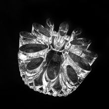 Load image into Gallery viewer, Stunning hand crafted BelMondo glass trivet with a tree-like root structure design. Intended to be used as a trivet or warmer in conjunction with a tealight to keep a pot warm. May be used to keep beverages or foods warm. Crafted by Glasdesign George Schütte, West Germany, circa 1980s. An impressive piece of textured glass that refracts light like magic!  In excellent condition, free from chips/wear.  Measures 2 1/2 x 6 inches
