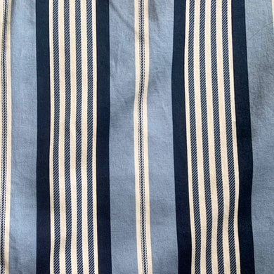 Vintage Big Ticking blue and white striped fabric remnant. Crafted by Michael Miller Fabrics. A classic textile for crafting and perfect for coastal decor.

Excellent condition, no tear/stains.

Measures 44 x 150 inches (just over 4 yards)