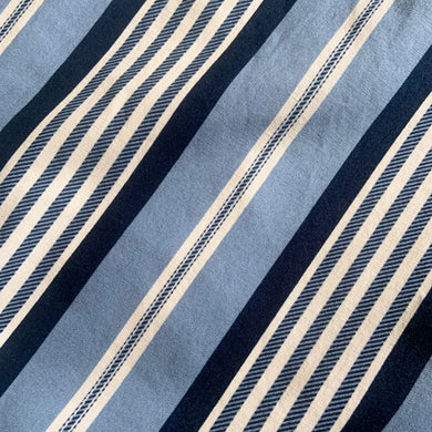 Vintage Big Ticking blue and white striped fabric remnant. Crafted by Michael Miller Fabrics. A classic textile for crafting and perfect for coastal decor.

Excellent condition, no tear/stains.

Measures 44 x 150 inches (just over 4 yards)