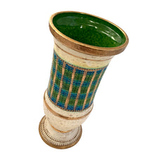 Load image into Gallery viewer, Vintage MCM art pottery footed vase with a band of repeating dots and stripes in shades of blue, green and gold on a pales butter yellow ground with gold details and green interior. Crafted by Bitossi Ceramiche, Italy 1960s. A wonderful piece of mid-century era art pottery to enhance your home's decor.

In good vintage condition, minor flea bit at the rim, no cracks or repairs. Sign on the bottom, 630 Italy.

Measures 6 x 12 3/4 inches

