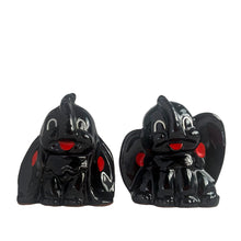Load image into Gallery viewer, Adorable pair of hand painted black lucky elephant salt and pepper shakers. Crafted by Shafford, Japan, 1950s. A sweet kitschy shaker set for your Shafford or shaker collection!

In excellent vintage condition, no chips, with corks.

Measures 3 x 1 1/2 x 3 inches
