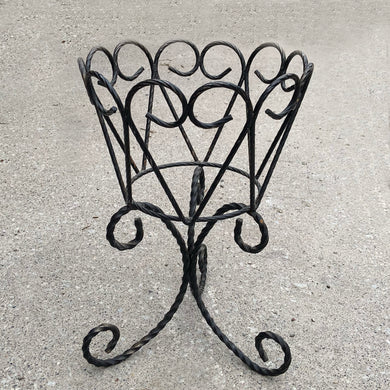 Vintage mid-century era black twisted wrought iron plant stand. Measures 11 1/2 x 18 inches Jacks Daughter of All Trades Vintage Antique Retro Mid-Century Modern Kitsch Store Shop Reseller Etsy Shopify Toronto Canada Free Porch Pick Up Local Delivery Worldwide Shipping Judy Weinberg Unique Housewarming Hostess Sustainable Gift Home Decor Collectible Collector Mothers Day Farmhouse Cottage Core Shabby Chic Container Gardening Hollywood Regency