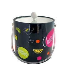 Load image into Gallery viewer, Fabulous vintage black ice bucket featuring colourful cocktail graphics, complemented by a clear lucite lid and handle with white lining and knob. Made in Taiwan, 1970s. Add the fun factor to your retro barware collection!

The bucket is in great vintage condition with minor wear, see photos.

Measures 7 1/2 x 8 1/2 inches (12 1/4 with handle extended)
