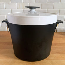 Load image into Gallery viewer, Vintage black and white THERM WARE ice bucket featuring brass brackets that hold the lid securely in place. Designed and crafted by David Douglas Company, USA, 1950s. This generous sized vessel is a fabulous example of mid-century design and ingenuity, perfect for any barware collection!  In immaculate vintage condition.  Measures 10 1/2 x 8 1/2 (incl. handles)
