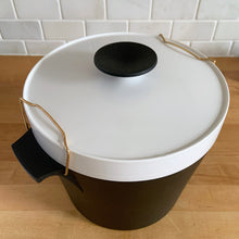 Load image into Gallery viewer, Vintage black and white THERM WARE ice bucket featuring brass brackets that hold the lid securely in place. Designed and crafted by David Douglas Company, USA, 1950s. This generous sized vessel is a fabulous example of mid-century design and ingenuity, perfect for any barware collection!  In immaculate vintage condition.  Measures 10 1/2 x 8 1/2 (incl. handles)
