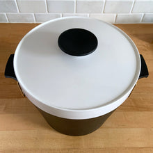 Load image into Gallery viewer, Vintage black and white THERM WARE ice bucket featuring brass brackets that hold the lid securely in place. Designed and crafted by David Douglas Company, USA, 1950s. This generous sized vessel is a fabulous example of mid-century design and ingenuity, perfect for any barware collection!  In immaculate vintage condition.  Measures 10 1/2 x 8 1/2 (incl. handles)
