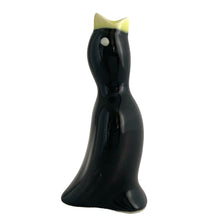 Load image into Gallery viewer, Vintage ceramic black pie bird with a yellow beak and eyes. Crafted by Norpro, Taiwan, 1980s. An essential accessory for the pie baker that allows steam to vent while a pie is baking to help prevent the fruit from bubbling over.  In excellent condition, no chips.  Measures 1 3/4 x 1 3/4 x 3 7/8 inches
