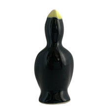 Load image into Gallery viewer, Vintage ceramic black pie bird with a yellow beak and eyes. Crafted by Norpro, Taiwan, 1980s. An essential accessory for the pie baker that allows steam to vent while a pie is baking to help prevent the fruit from bubbling over.  In excellent condition, no chips.  Measures 1 3/4 x 1 3/4 x 3 7/8 inches

