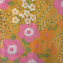 Load image into Gallery viewer, Vintage Blossoms Here and There double/full size flat and fitted sheets in shades of pink, orange and green on a deep yellow ground. Crafted by Wamsutta USA, 1973. This colourful mod flower power print brings so much fun and energy to your bedroom and home decor or repurpose for crafting!

Fabric is in good vintage condition. Original label present.&nbsp;

Flat sheet measures 81 x 100 inches

Fitted sheet fits 54 x 75 inch
