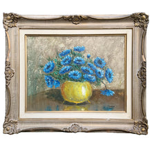 Load image into Gallery viewer, Breathtaking beautiful vintage floral still life of blue anemone flowers in a yellow vase. This piece is a skillfully hand-painted original oil on board and signed by the artist, G. Hillman. Ornate wood frame. Lovingly crafted, this one-of-a-kind piece will add an exquisite touch of warmth to your home decor.

Art board measures 17 1/4 x 13 1/2 inch

Framed measurements 24 3/4 x 20 1/2 inches

The painting is in excellent condition, however, the frame has condition issues.
