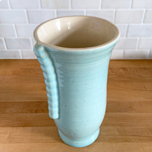 Load image into Gallery viewer, Front three-quarter view of vintage Brentleigh Ware Art Deco celadon blue gloss glazed ceramic vase with cream interior and ribbed handles
