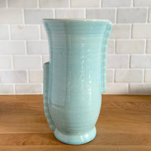 Load image into Gallery viewer, Rear view of vintage Brentleigh Ware Art Deco celadon blue gloss glazed ceramic vase, highlighting ribbed vertical fin handles and hourglass silhouette
