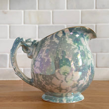 Load image into Gallery viewer, Beautiful vintage iridescent blue Brocade bone china milk or cream pitcher jug, rimmed in gold gilt. Crafted by Royal Winton Grimwades, England, between 1934 - 1950. A stunning example of Chintz and cottage and shabby chic style!

In great vintage condition, no chips/cracks/repairs, age-related crazing, minor wear to the gold rim, see photos.

Measures 6 1/4 x 4 x 4 3/4 inches
