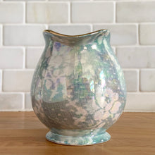 Load image into Gallery viewer, Beautiful vintage iridescent blue Brocade bone china milk or cream pitcher jug, rimmed in gold gilt. Crafted by Royal Winton Grimwades, England, between 1934 - 1950. A stunning example of Chintz and cottage and shabby chic style!

In great vintage condition, no chips/cracks/repairs, age-related crazing, minor wear to the gold rim, see photos.

Measures 6 1/4 x 4 x 4 3/4 inches
