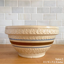 Load image into Gallery viewer, Vintage yellow ware mixing bowl featuring brown and blue bands with diamond pattern. Crafted by Robinson Ransbottom, USA, 1930s. A well-crafted piece of stoneware offering a nostalgic vibe to your farmhouse or cottage kitchenware and decor!

Option 2: Measures 8 3/16 x 4 3/8 inches. In as found condition, chip to the foot and rim, no cracks/repairs, age-related crazing. Crown mark.
