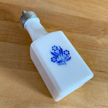 Load image into Gallery viewer, Classic vintage white milk glass vinegar dispenser, featuring blue cornflowers and a plasticized chrome lid. Crafted by Dominion Glass Canada, circa 1970.  In excellent condition&nbsp;with only minor wear to the chrome, the glass is free from chips/cracks.  Measures 2 x 2 x 6 inches
